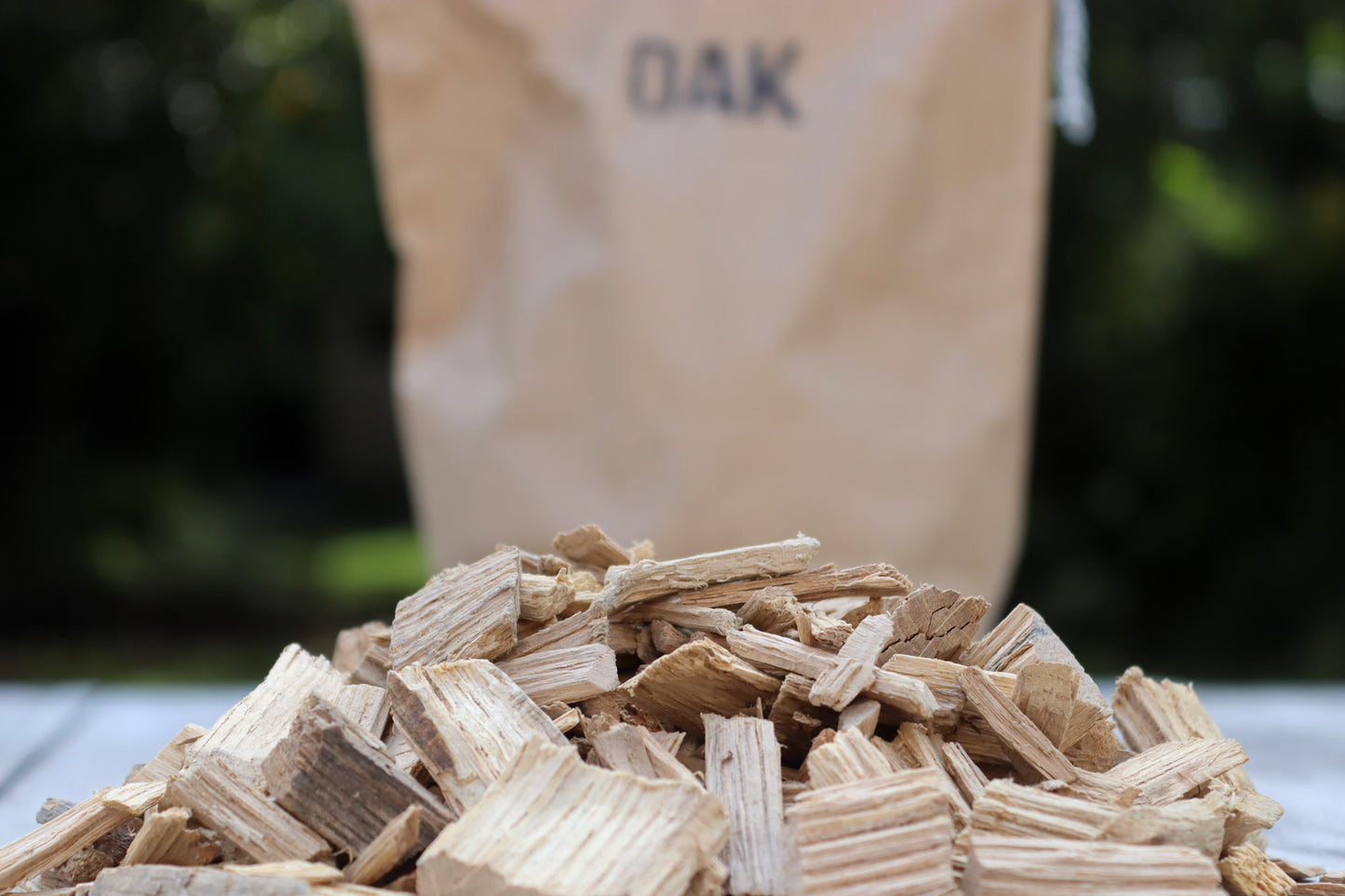 Love Logs British oak smoking chips in pile on tableLove Logs British oak smoking chips in pile on table