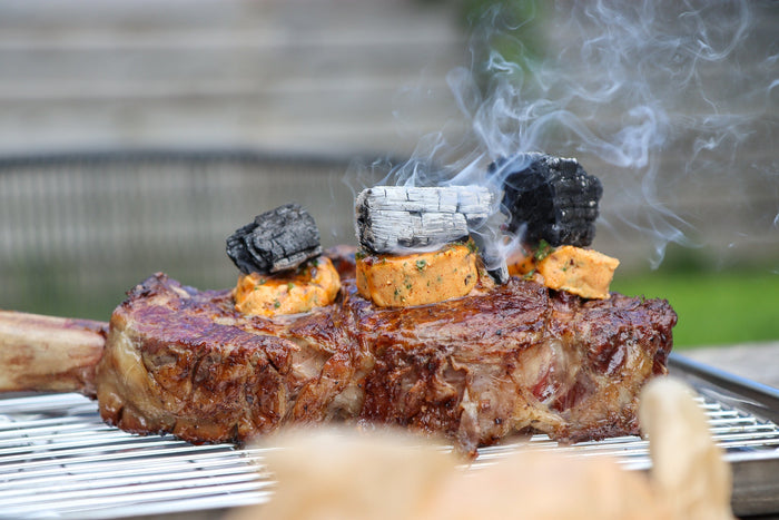Cowboy butter melting on to steak