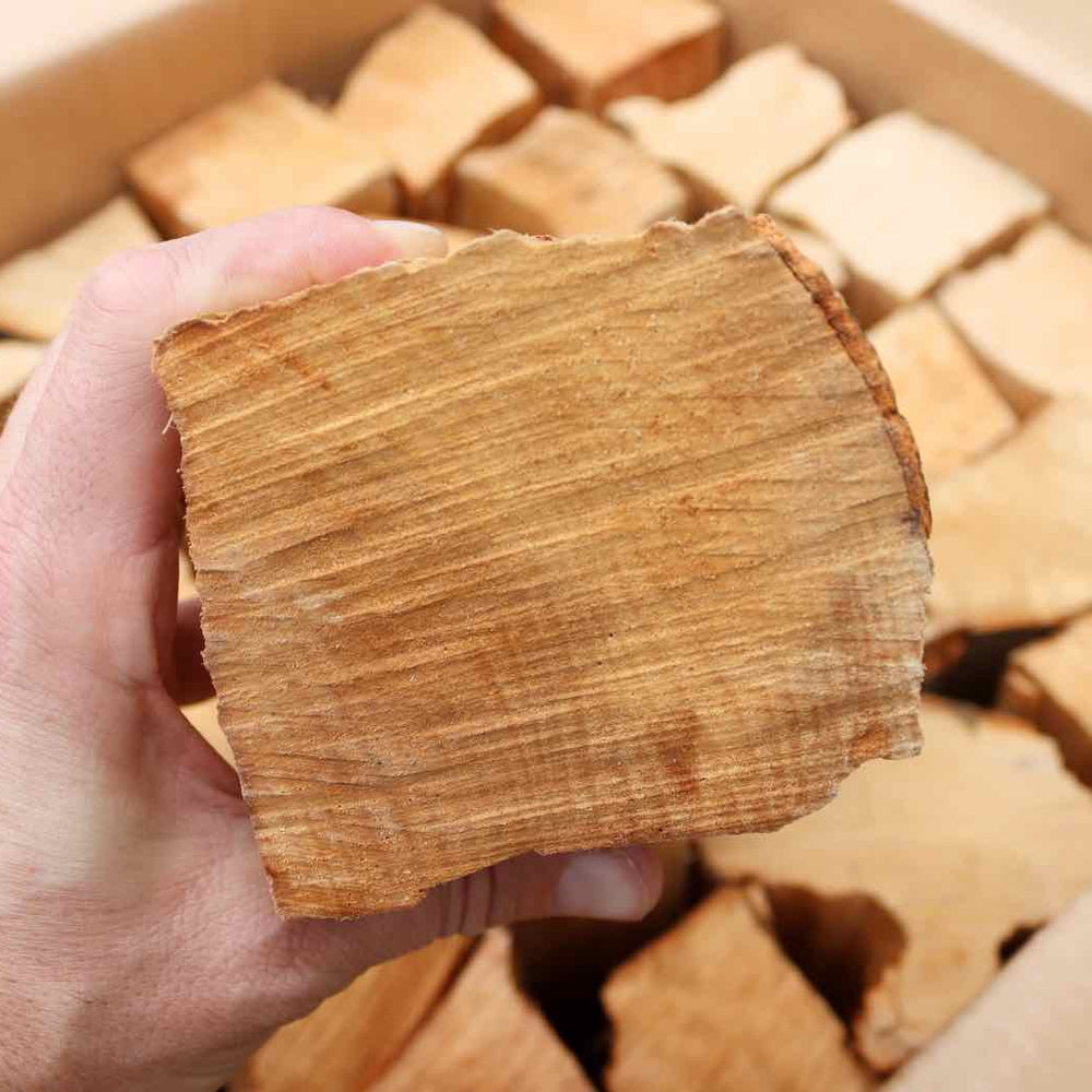 
                      
                        25cm British Kiln Dried  Log Held in Hand Showing Thickness
                      
                    